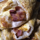 Illustration for article titled Cheese and bacon wraps